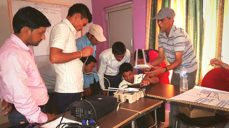 Teachers practice setting up the school network Doti 2018