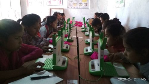 Students learning on laptops in Darchula